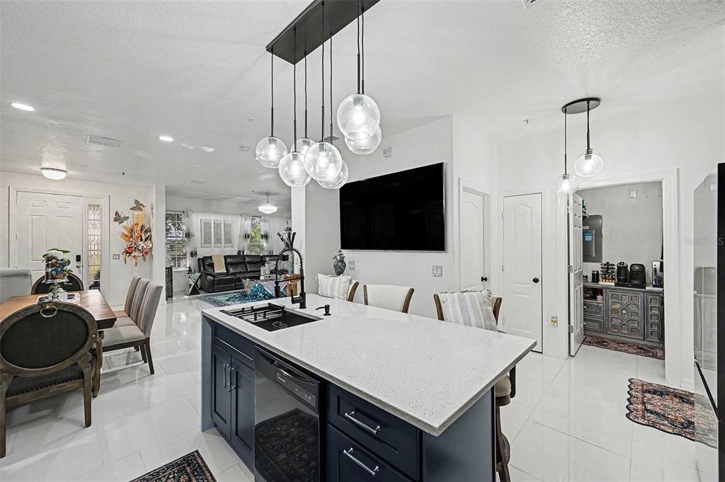 3565 Clay Brick Road Harmony, FL 34773 - Photo 14 of 37 a large kitchen with a table and chairs