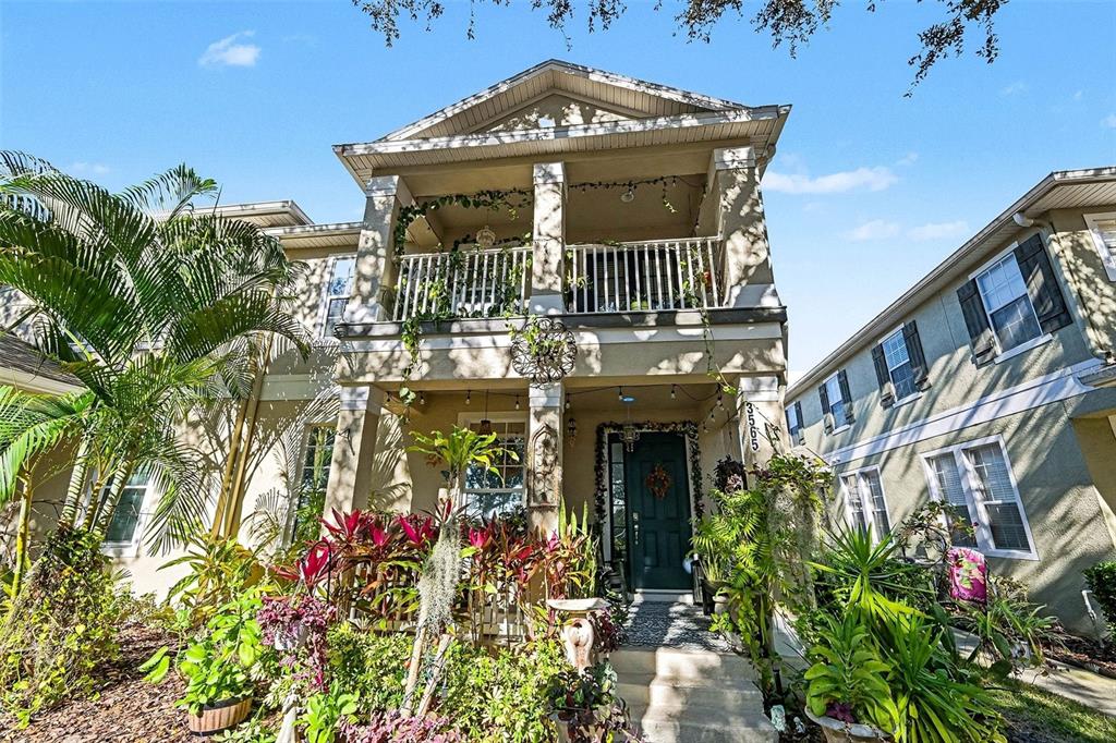 3565 Clay Brick Road Harmony, FL 34773 - Photo 2 of 37 a front view of a house with a yard