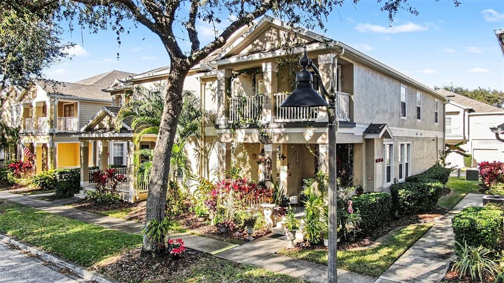 3565 Clay Brick Road Harmony, FL 34773 - Photo 29 of 37 a front view of a house with a yard