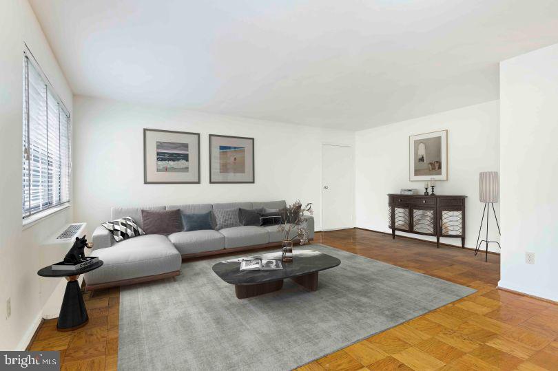 1920 North Calvert Street, Unit 2 BR 1 Arlington, VA 22201 - Photo 8 of 9 a living room with furniture and wooden floor