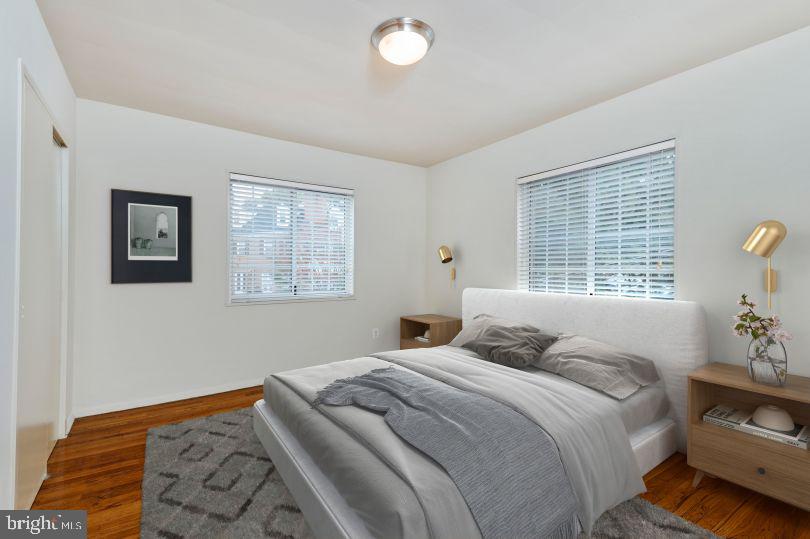 1920 North Calvert Street, Unit 2 BR 1 Arlington, VA 22201 - Photo 7 of 9 a bedroom with a bed and a window