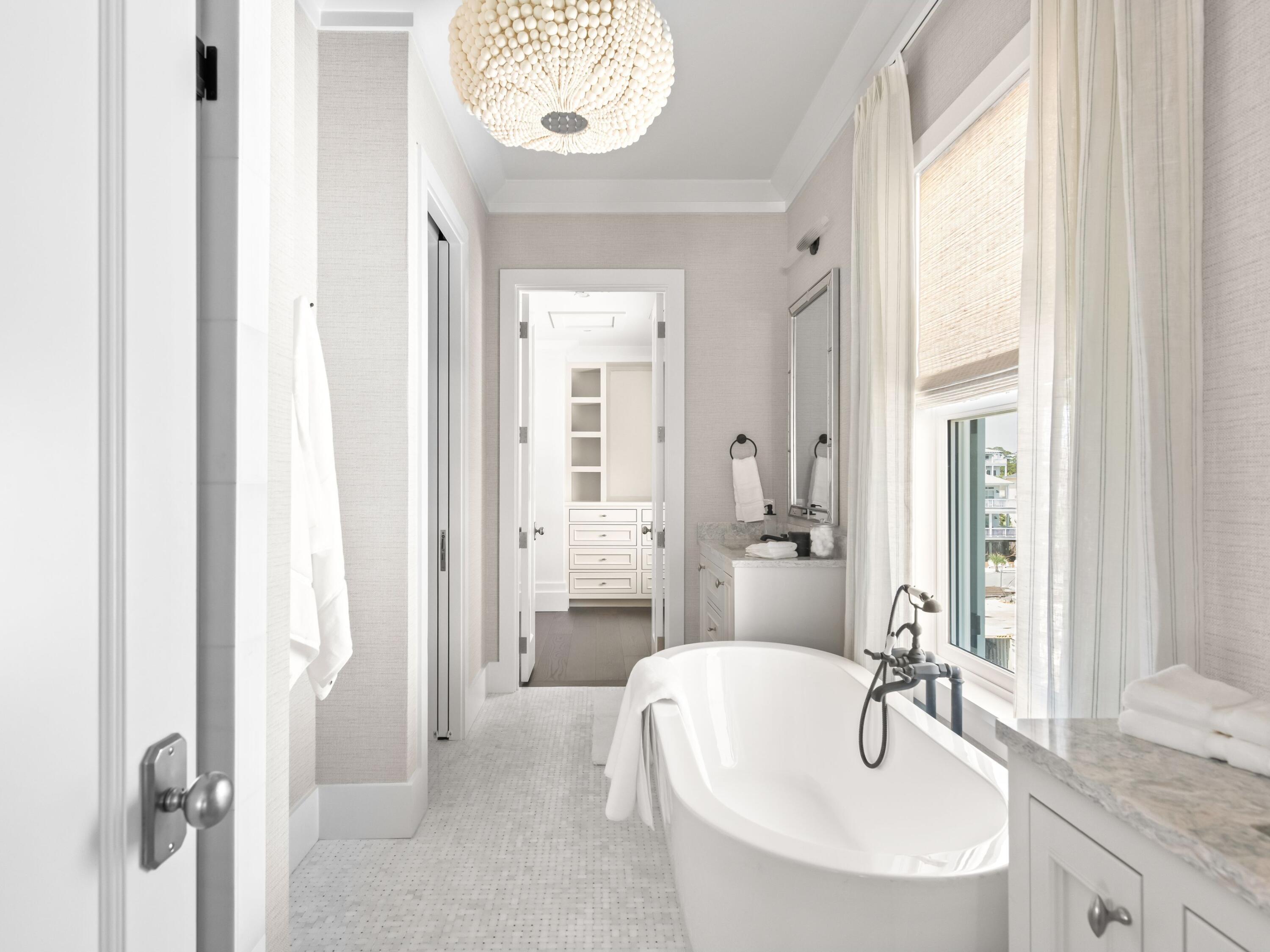 40 Lupin Bch Drive Inlet Beach, FL 32461 - Photo 24 of 35 a bathroom with a granite countertop sink and a mirror