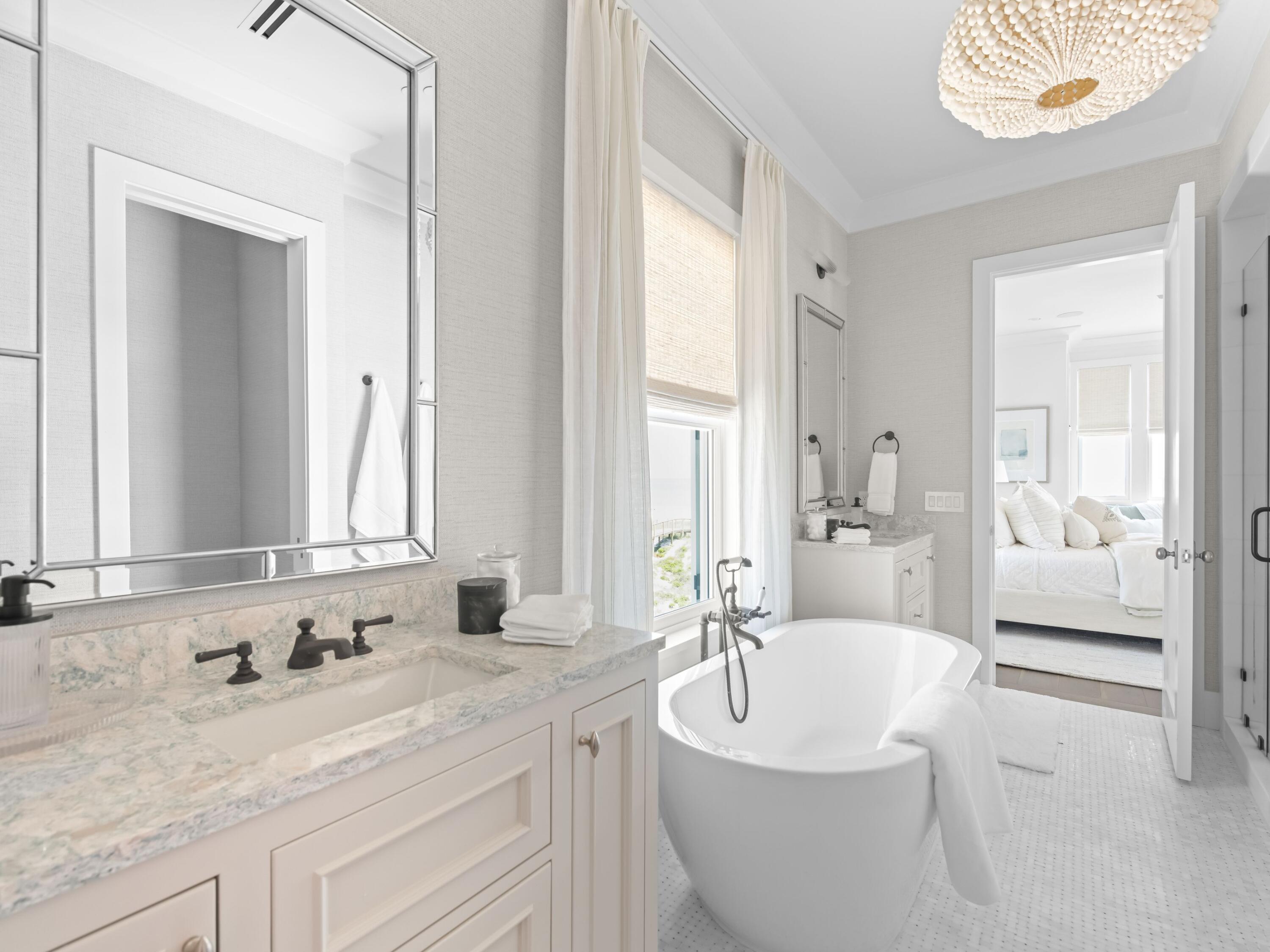 40 Lupin Bch Drive Inlet Beach, FL 32461 - Photo 26 of 35 a bath room with a sink and a mirror