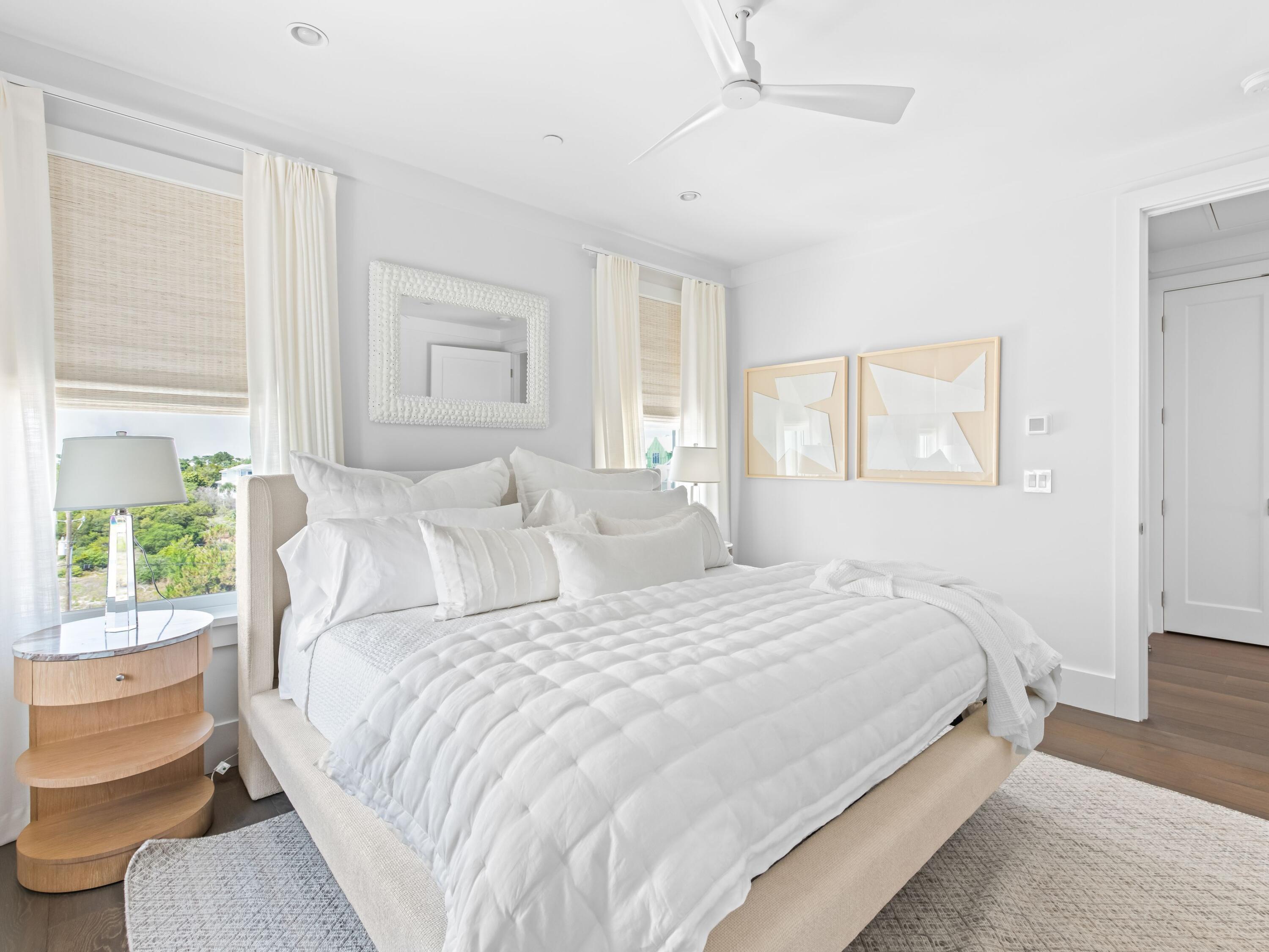 40 Lupin Bch Drive Inlet Beach, FL 32461 - Photo 29 of 35 a bedroom with a bed and a window with outer view