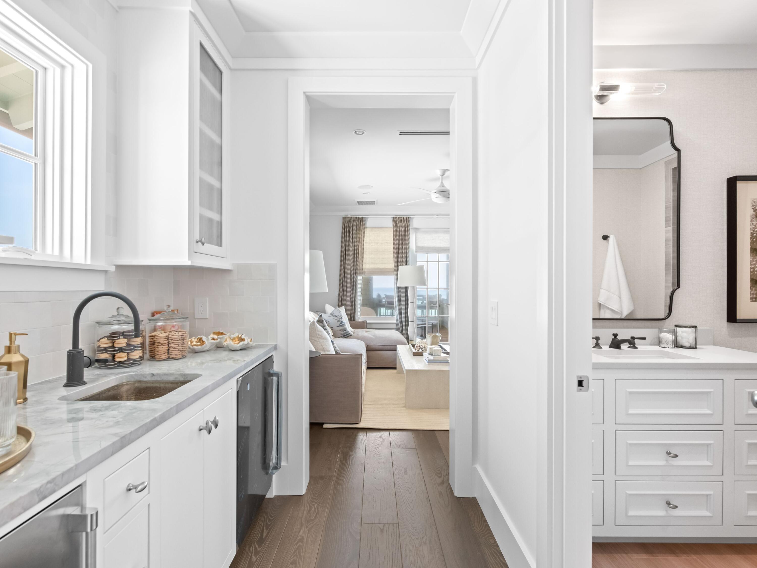 40 Lupin Bch Drive Inlet Beach, FL 32461 - Photo 31 of 35 a kitchen with a sink cabinets and wooden floor