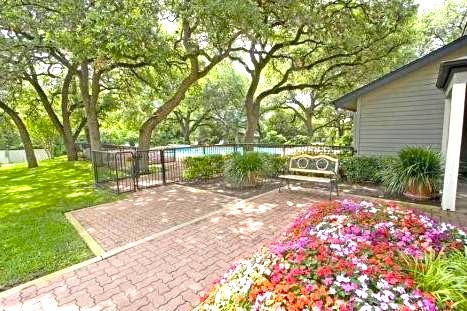 a view of a backyard with a garden