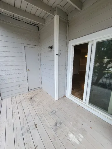 a view of a backyard of the house