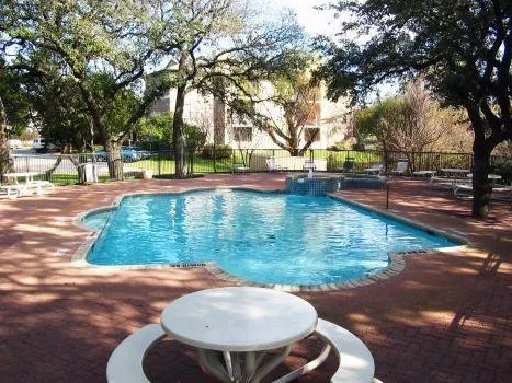a view of outdoor space with swimming pool