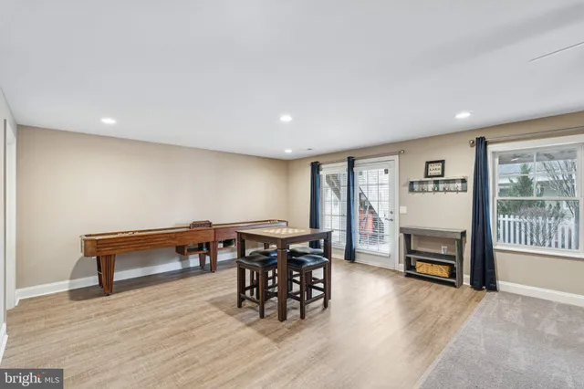 a bathroom with a sink toilet and a mirror