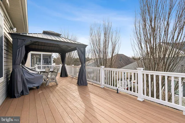 a front view of a house with stairs