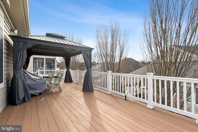 a front view of a house with stairs