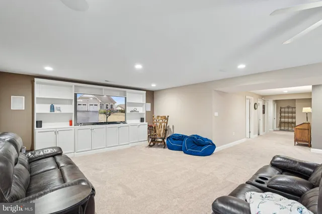 a large living room with furniture