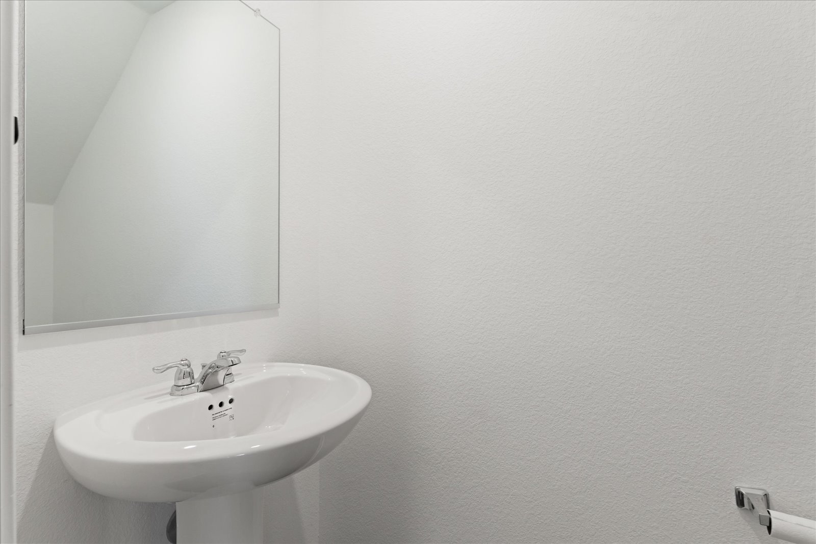 905 Powell Kyle, TX 78640 - Photo 15 of 37 a bathroom with a sink and a mirror