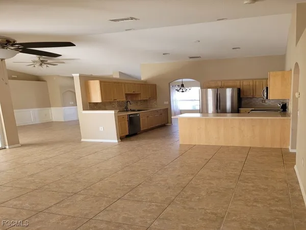 a view of a kitchen with a sink