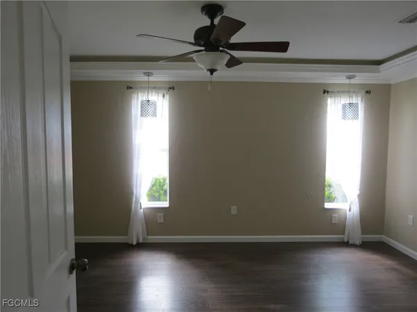 a view of an empty room and window