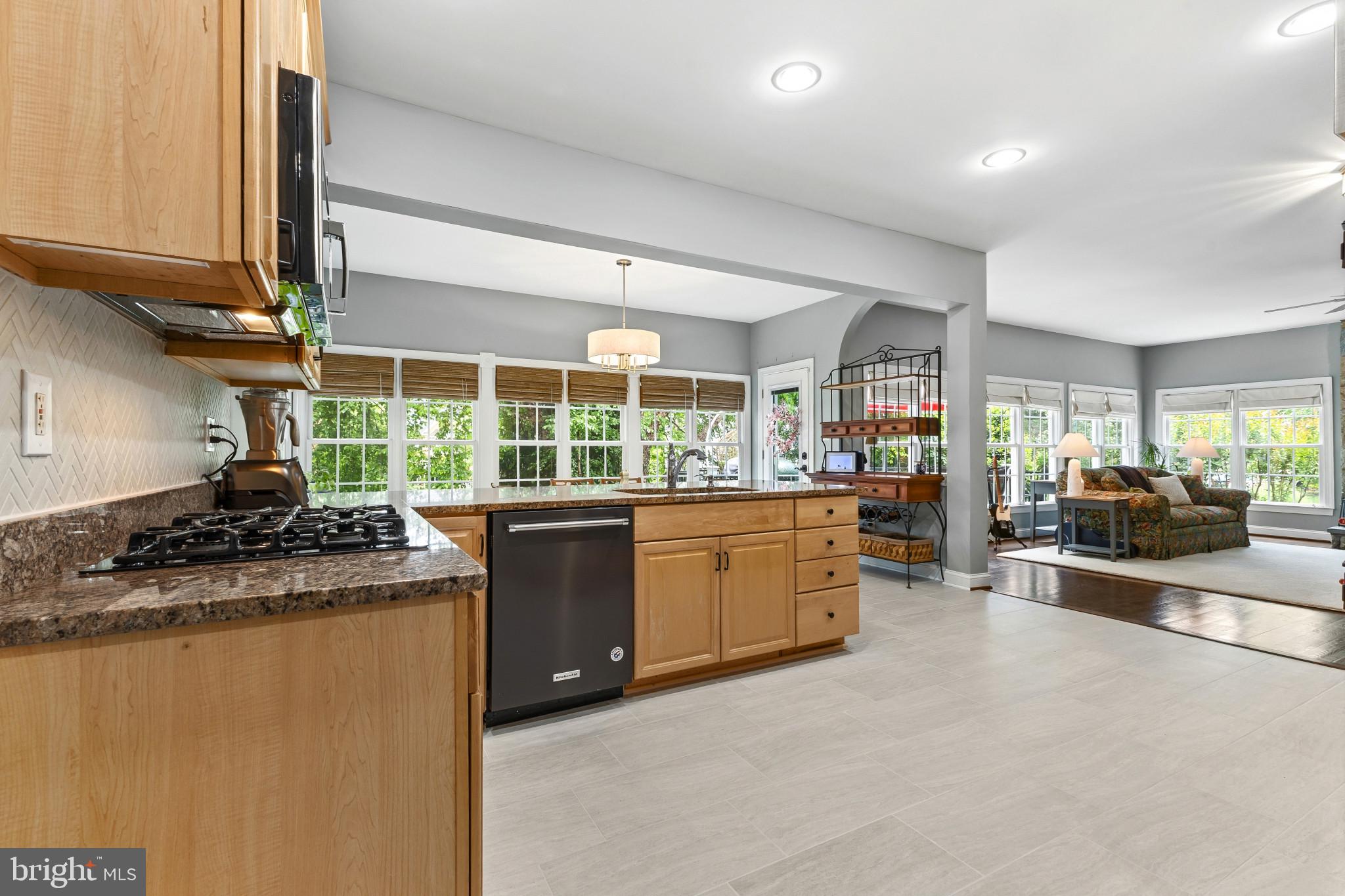 15006 Ransom Oaks Court Gainesville, VA 20155 - Photo 10 of 57 Bright and airy open-concept kitchen.