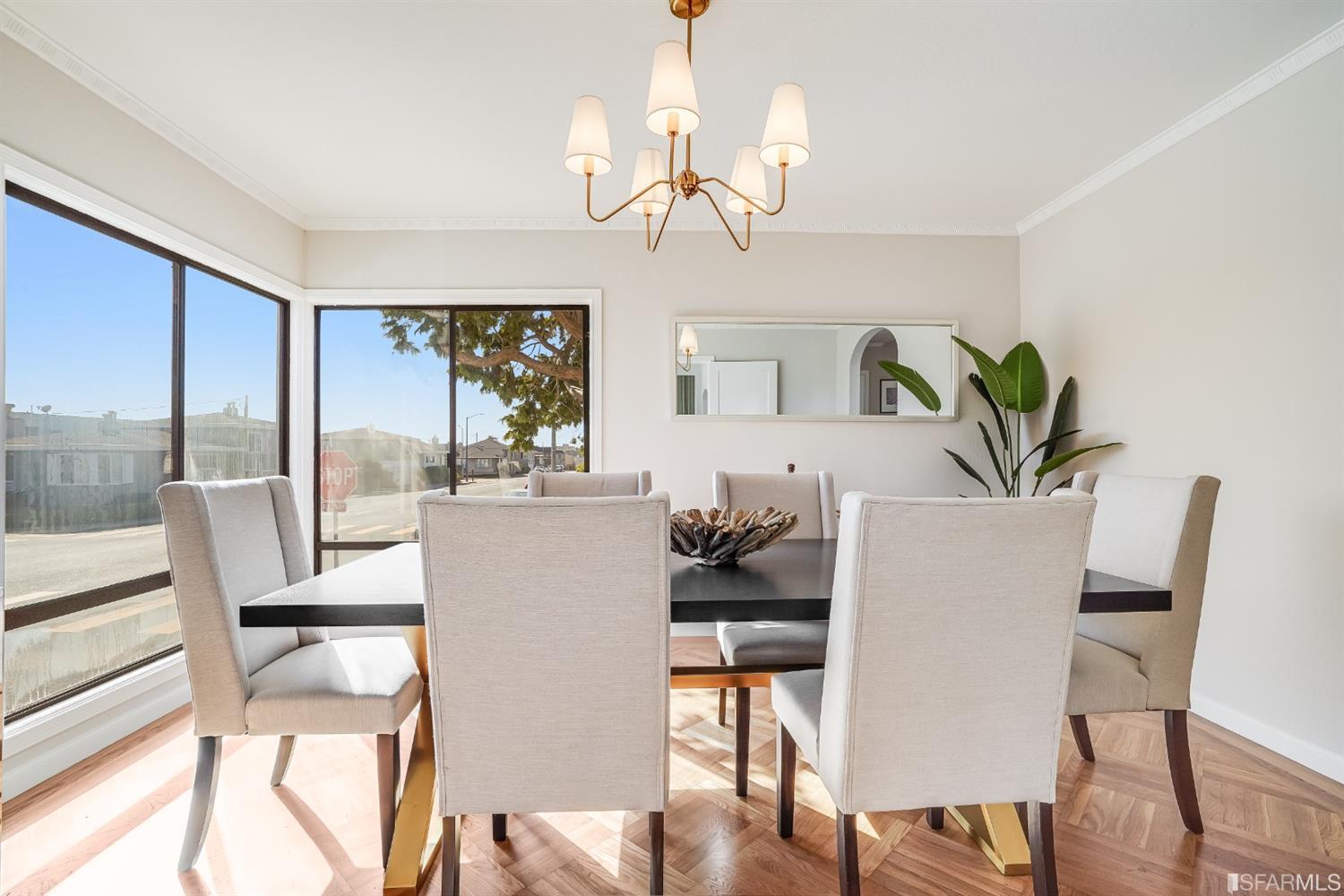 96 Middlefield Drive San Francisco, CA 94132 - Photo 13 of 46 a view of a dining room with furniture window and wooden floor