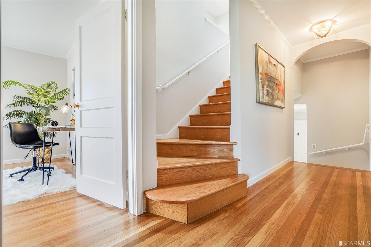 96 Middlefield Drive San Francisco, CA 94132 - Photo 18 of 46 a view of entryway and hall with wooden floor