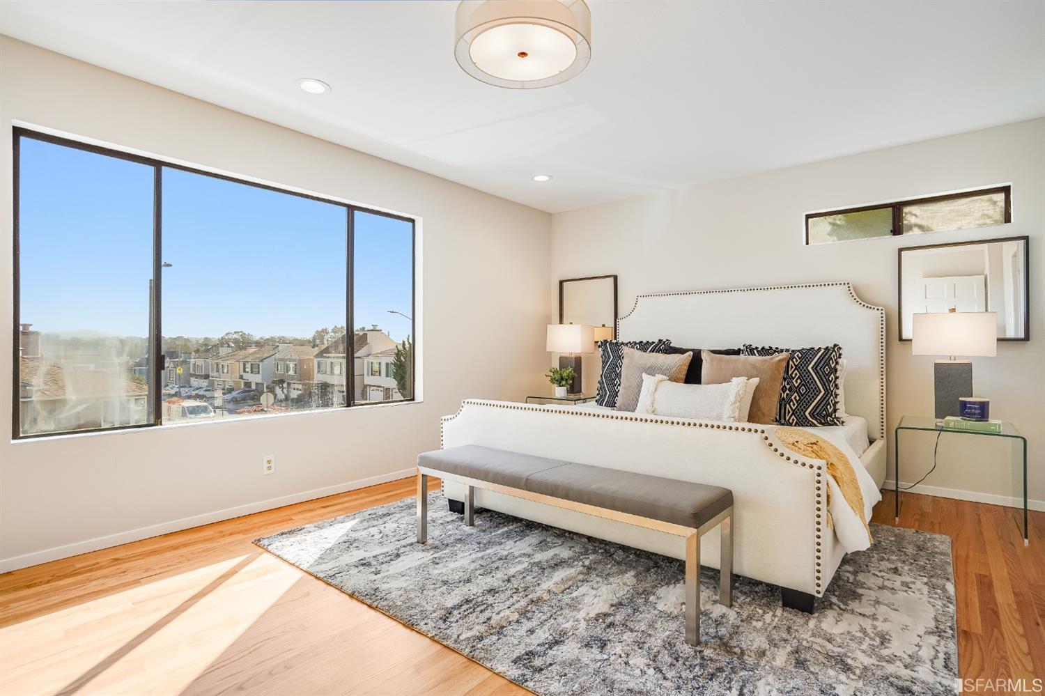 96 Middlefield Drive San Francisco, CA 94132 - Photo 20 of 46 a bed sitting in a bedroom next to a window