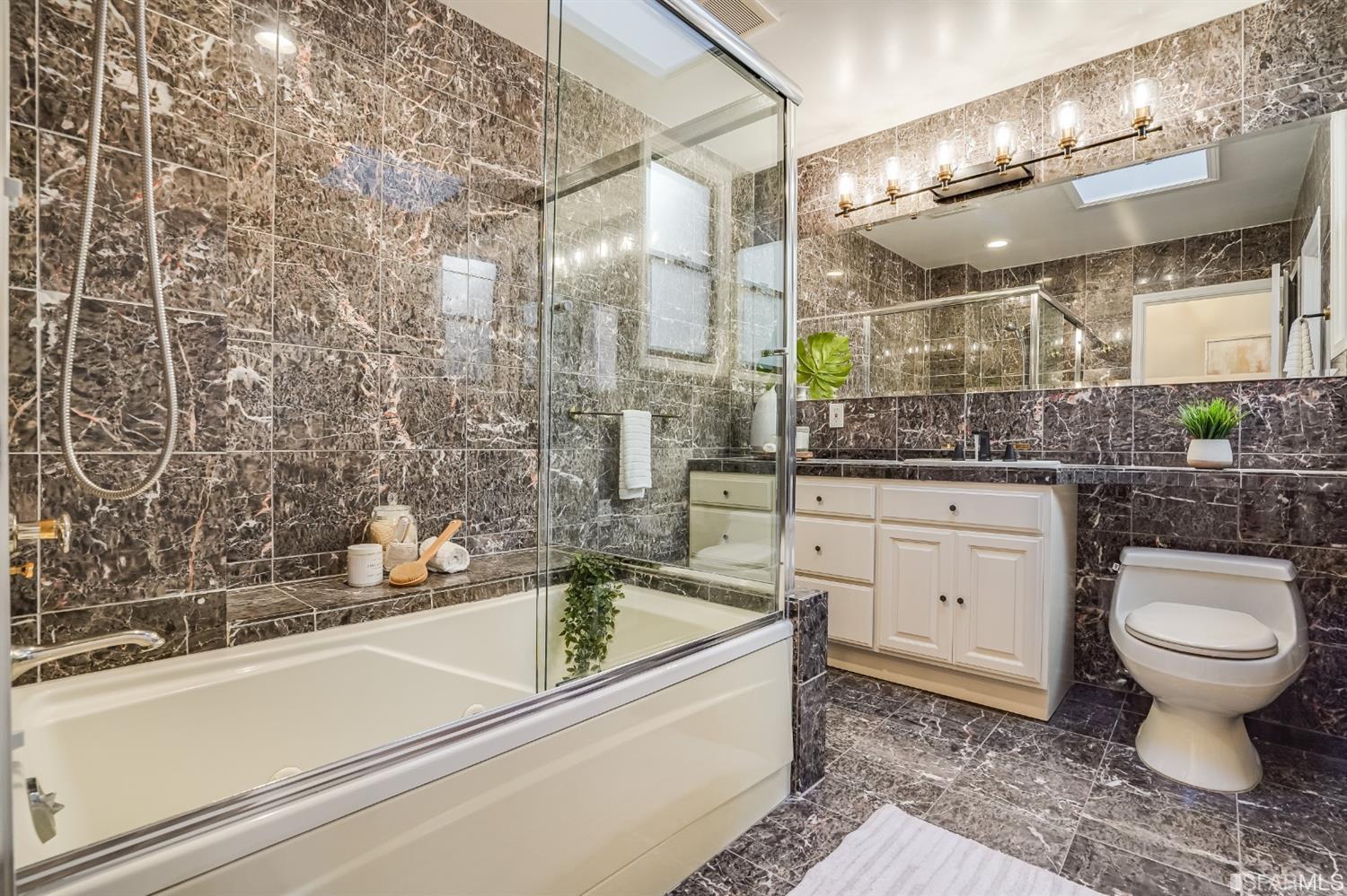 96 Middlefield Drive San Francisco, CA 94132 - Photo 26 of 46 a bathroom with a sink a toilet and shower