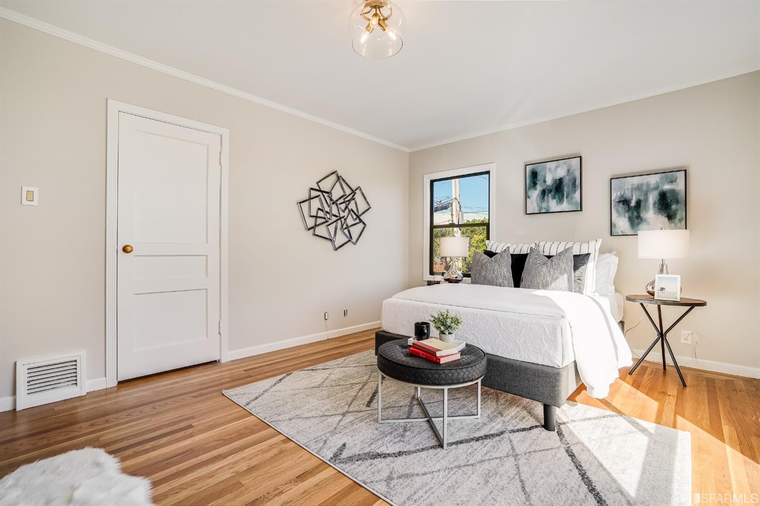 96 Middlefield Drive San Francisco, CA 94132 - Photo 29 of 46 a bedroom with a bed and a table