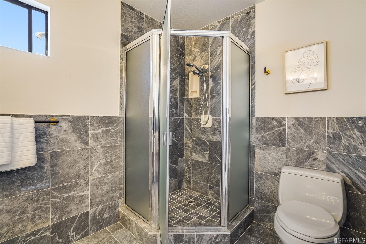 96 Middlefield Drive San Francisco, CA 94132 - Photo 36 of 46 a bathroom with a toilet and shower