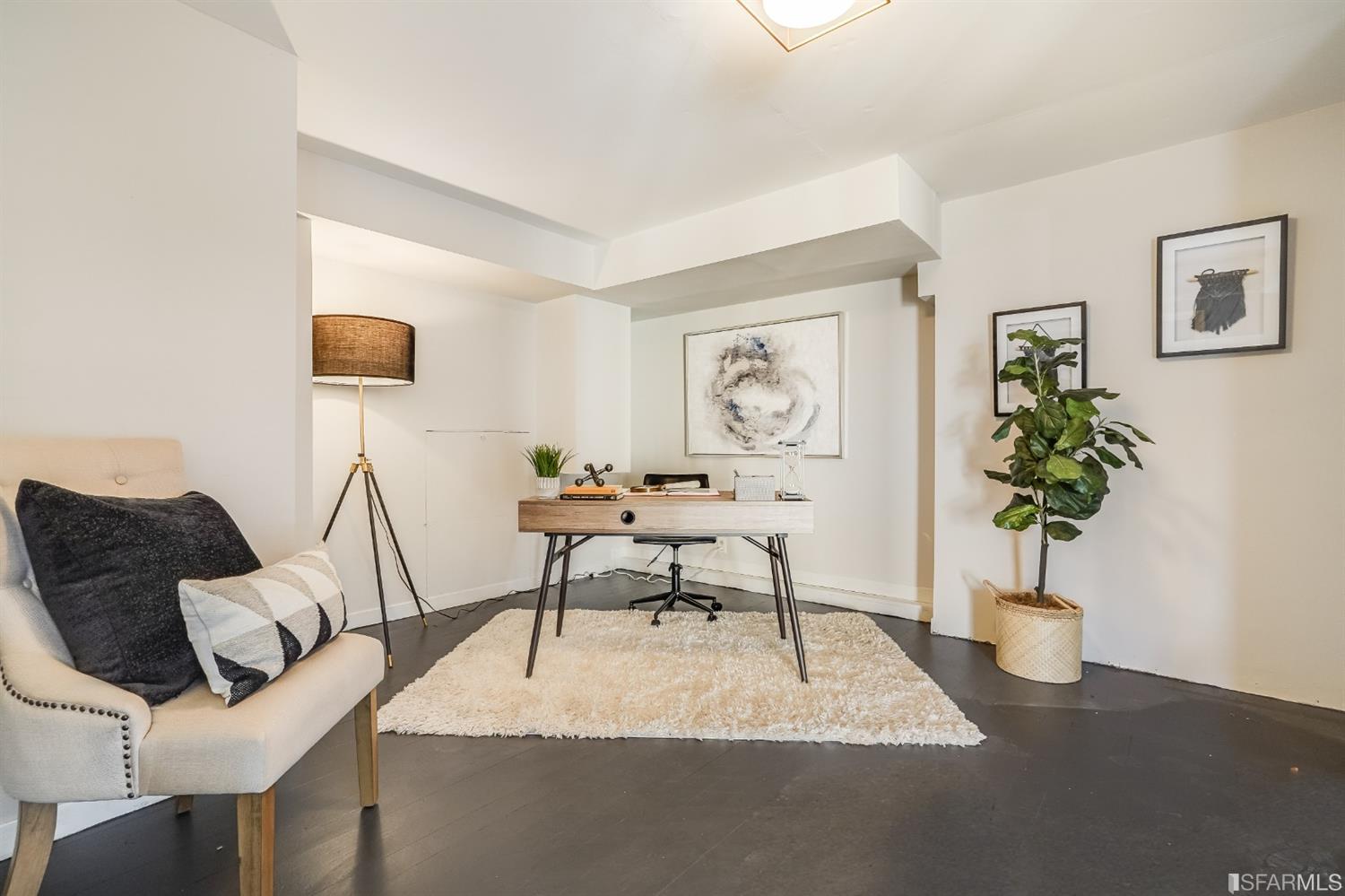 96 Middlefield Drive San Francisco, CA 94132 - Photo 37 of 46 a living room with furniture a potted plant and a lamp