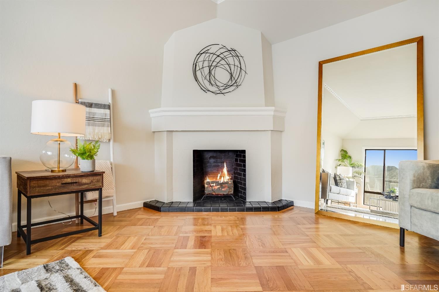 96 Middlefield Drive San Francisco, CA 94132 - Photo 10 of 46 a living room with furniture and a fireplace