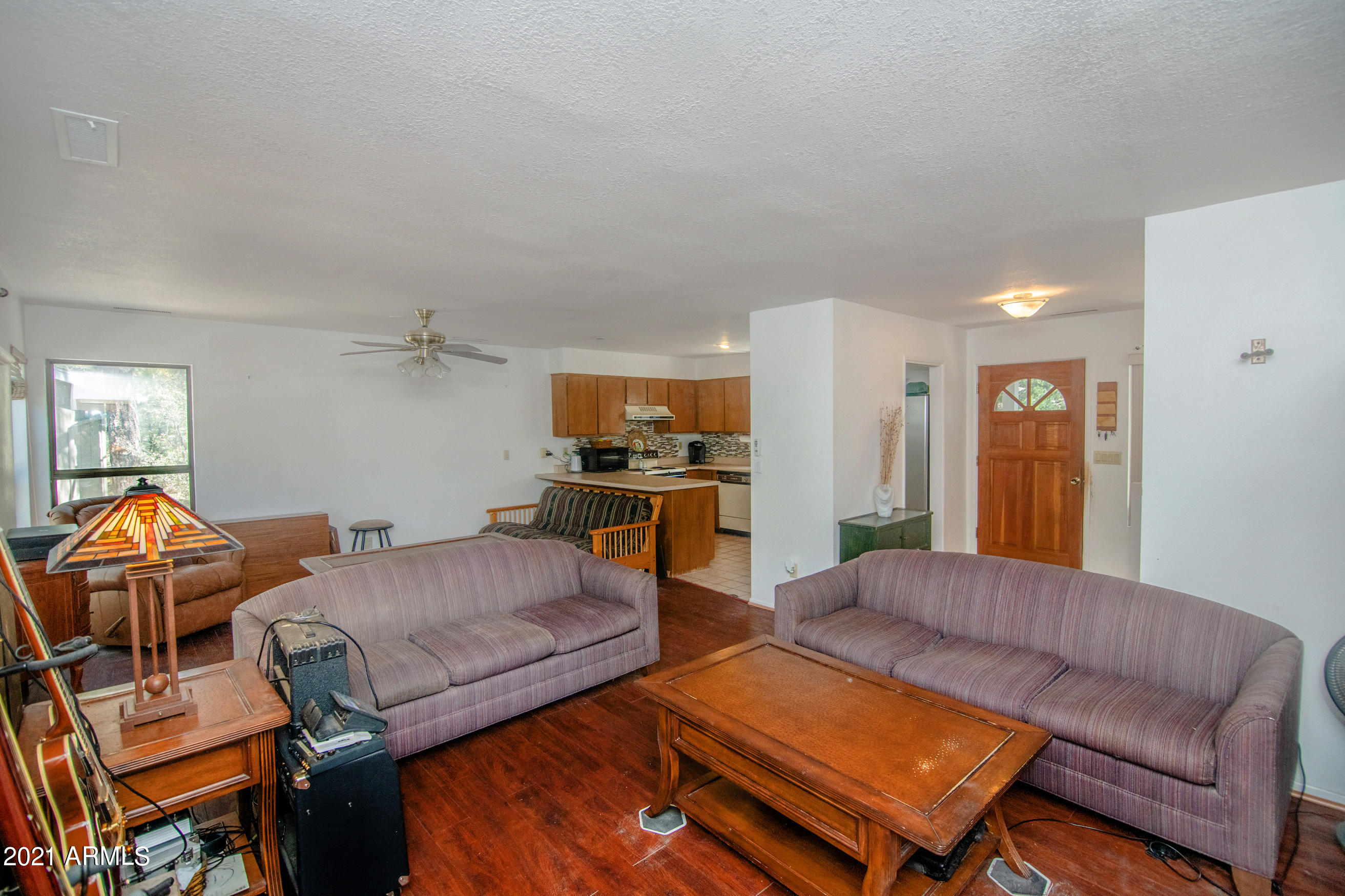 511 Turtleback Road Prescott, AZ 86303 - Photo 11 of 37 10_Living Room w Kitchen 02
