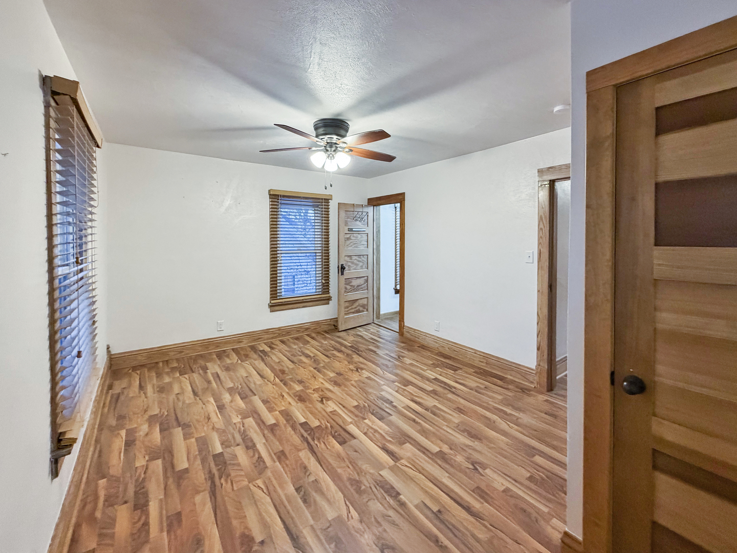 310 1st Avenue Forreston, IL 61030 - Photo 28 of 33 wooden floor in an empty room with a window