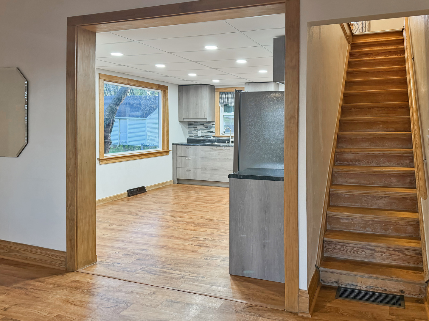 310 1st Avenue Forreston, IL 61030 - Photo 6 of 33 a view of entryway with wooden floor and a rug