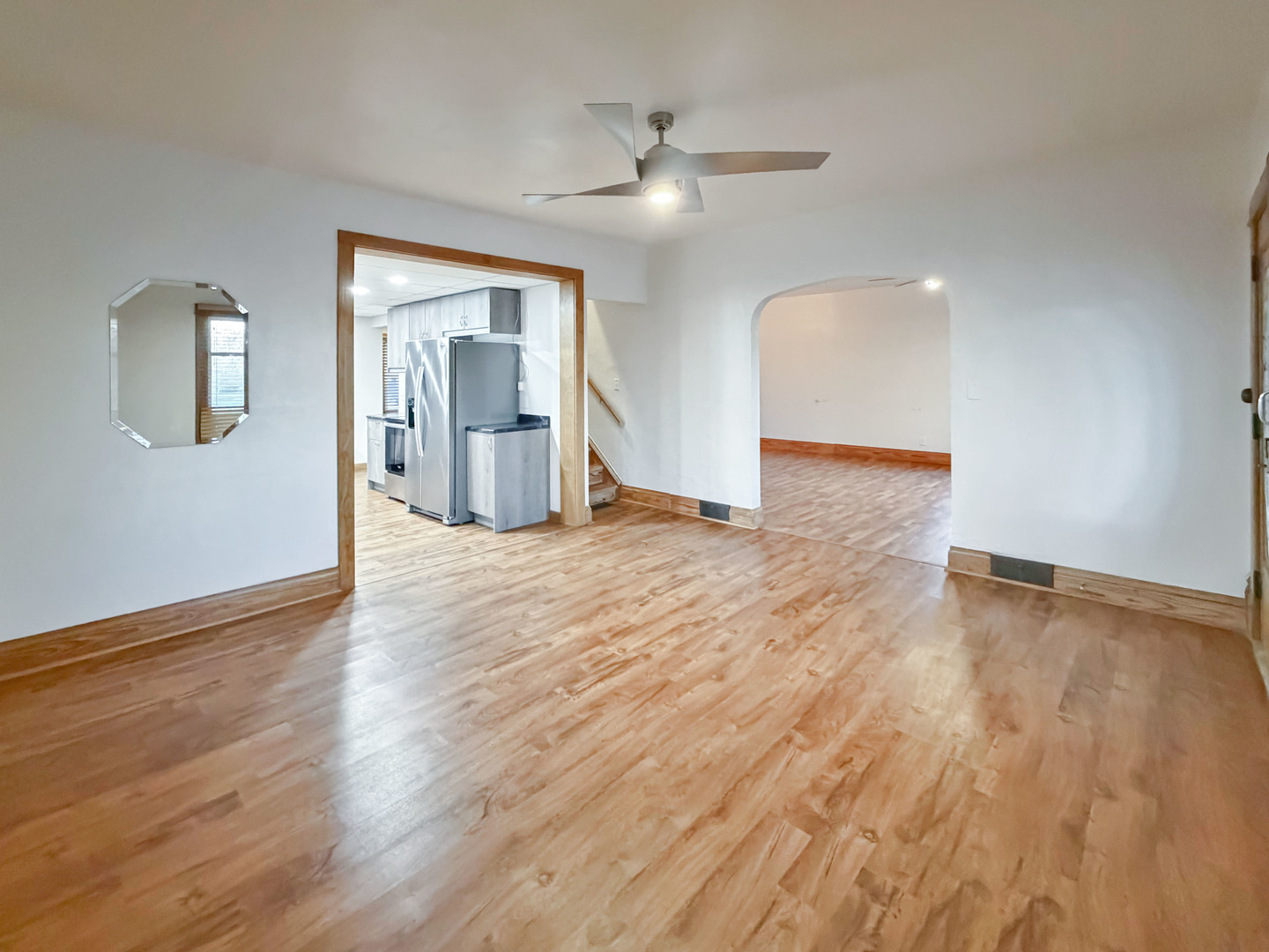 310 1st Avenue Forreston, IL 61030 - Photo 8 of 33 a view of a livingroom with wooden floor and a ceiling fan