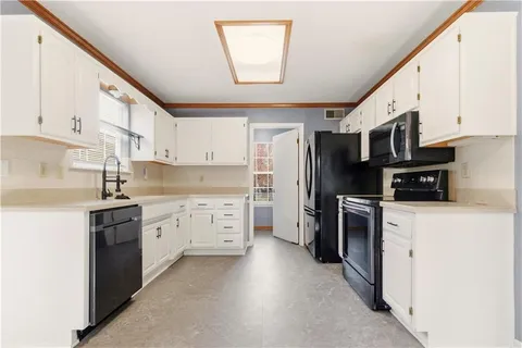 $330,000 | 1107 Huntington Lane, Greenwood, MO 64034