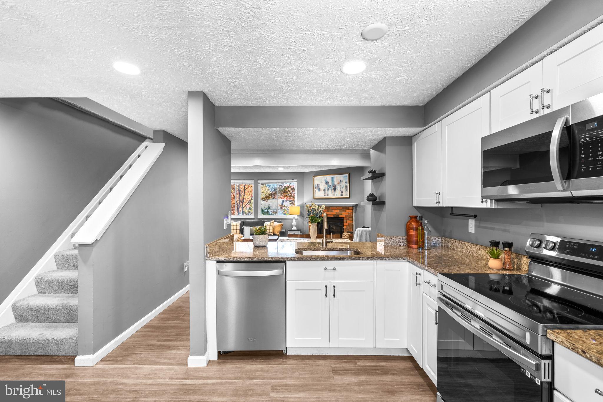 8433 Sugar Creek Lane Springfield, VA 22153 - Photo 13 of 47 Granite counters and stainless appliances