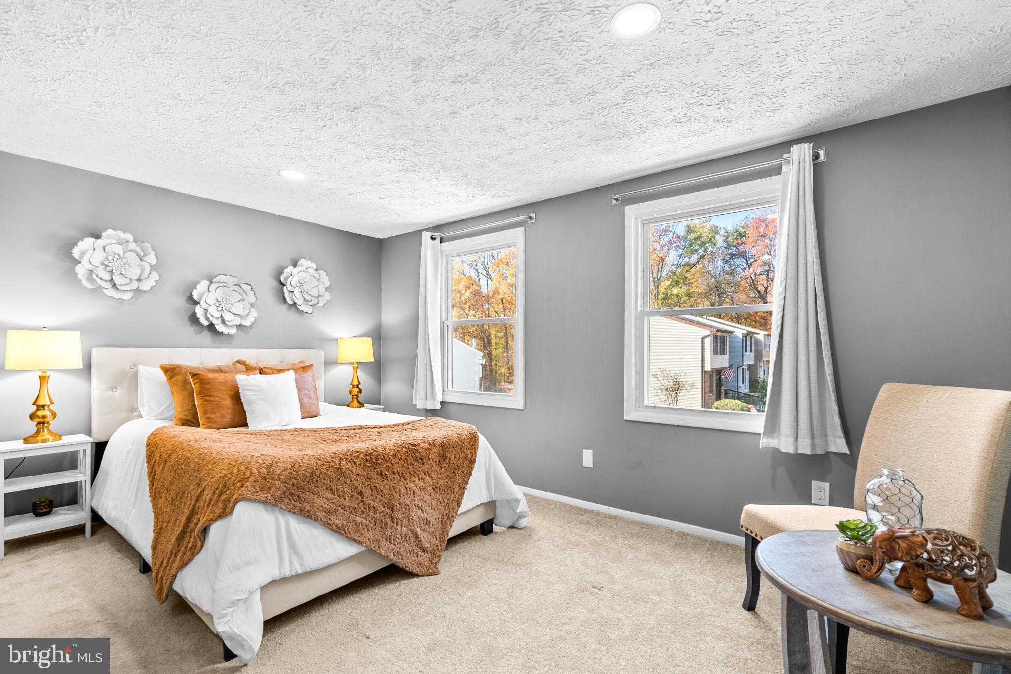 8433 Sugar Creek Lane Springfield, VA 22153 - Photo 17 of 47 Primary bedroom with natural light and charm.