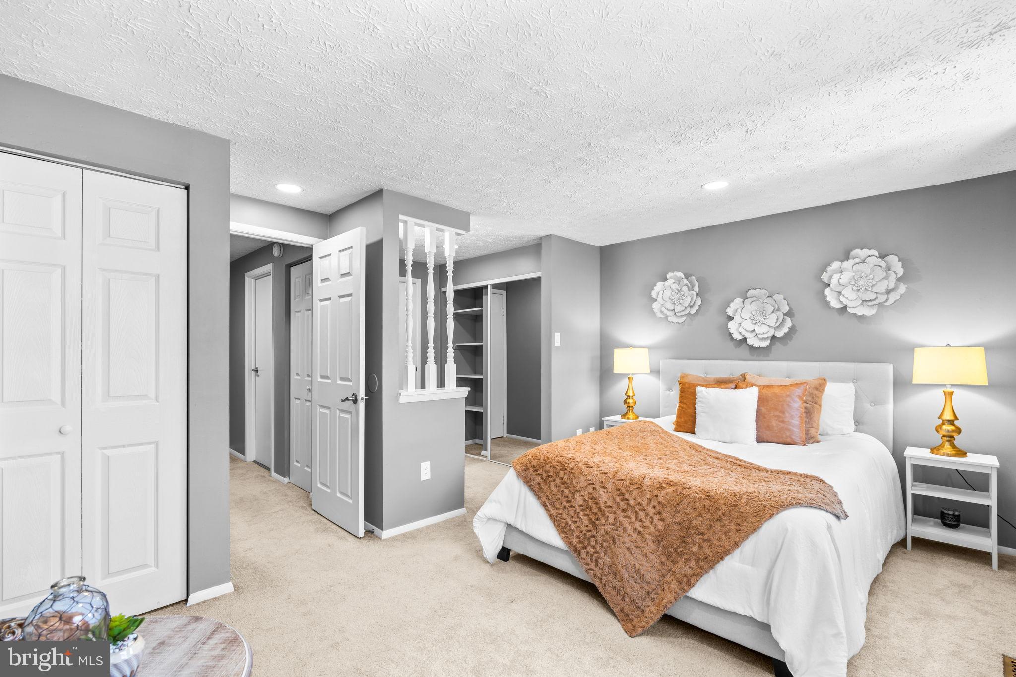 8433 Sugar Creek Lane Springfield, VA 22153 - Photo 18 of 47 Primary bedroom with elegant decor accents.