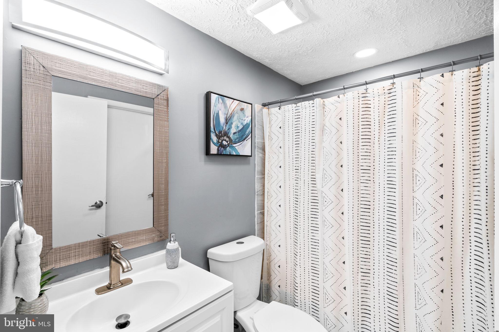 8433 Sugar Creek Lane Springfield, VA 22153 - Photo 24 of 47 Modern bathroom with stylish accents.