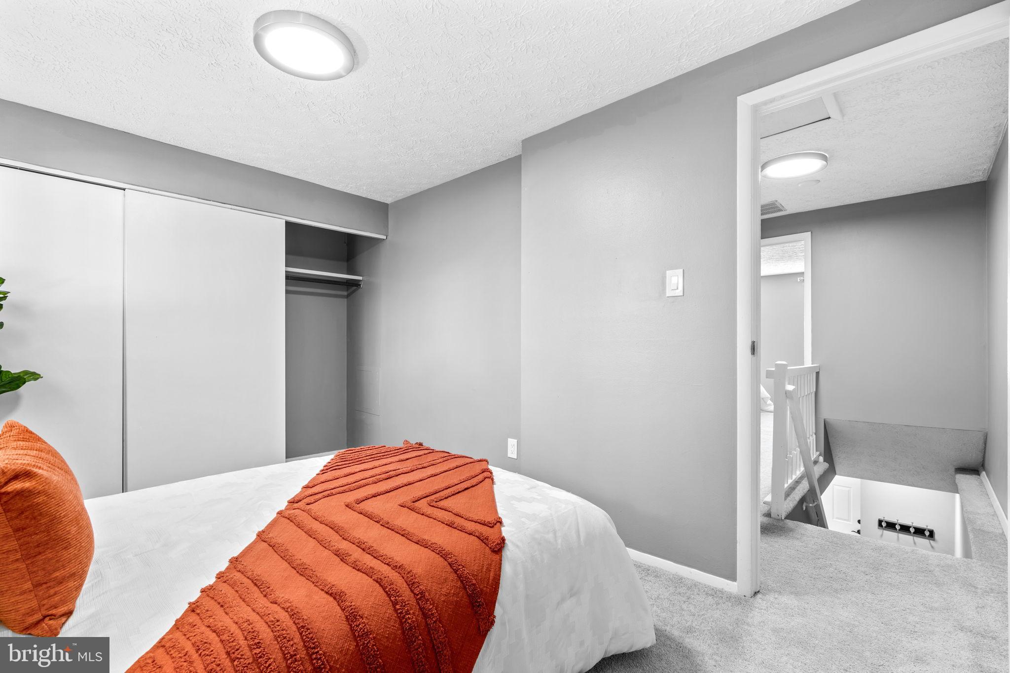 8433 Sugar Creek Lane Springfield, VA 22153 - Photo 29 of 47 Second bedroom with modern charm.