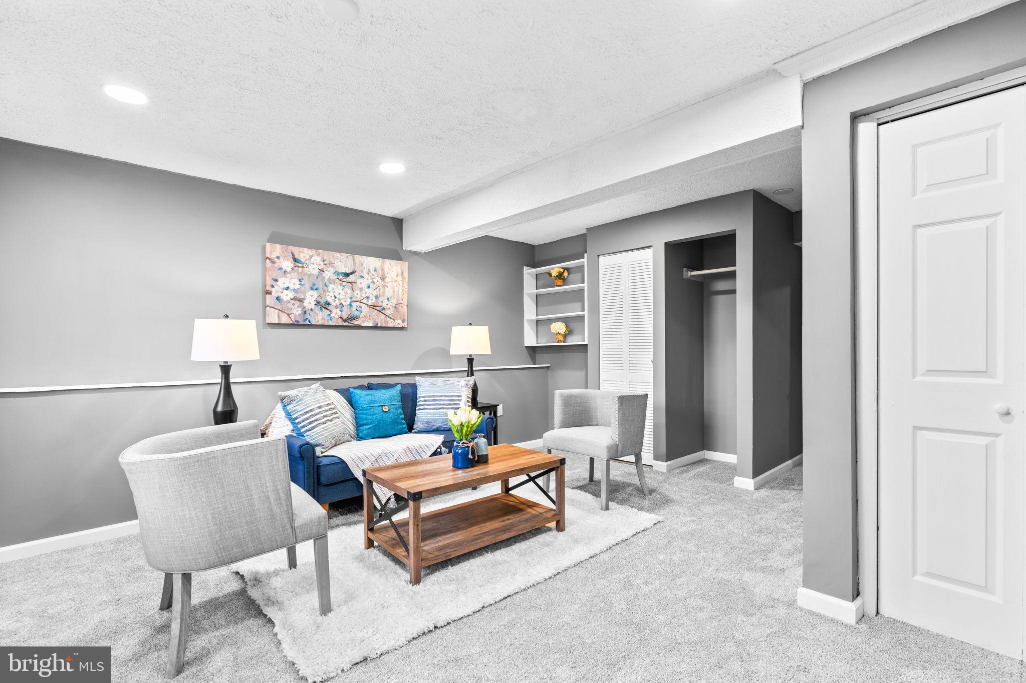 8433 Sugar Creek Lane Springfield, VA 22153 - Photo 31 of 47 Basement rec room or den with cozy ambiance.