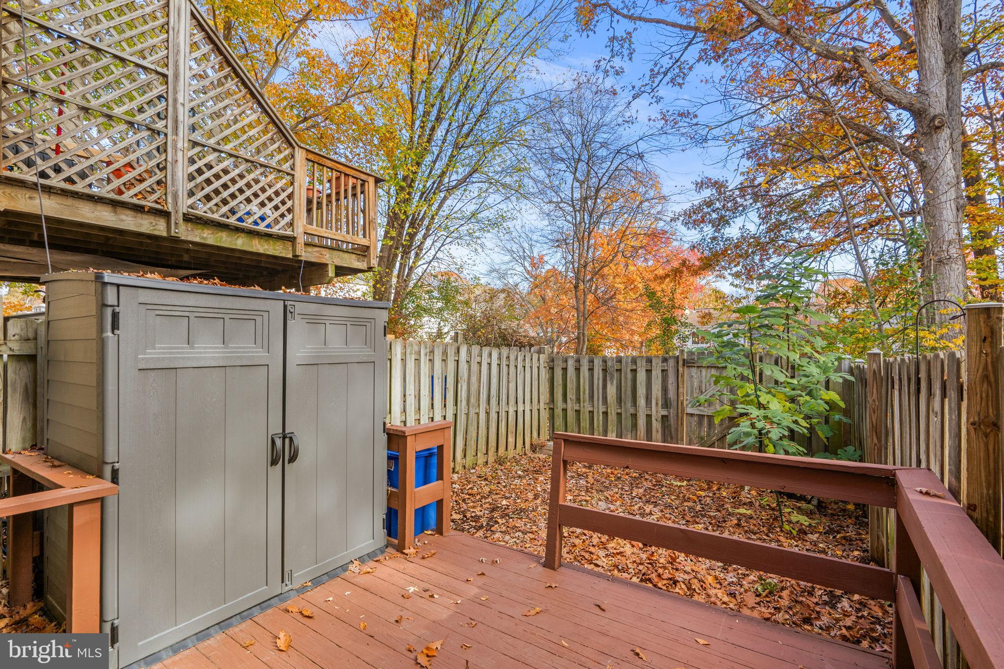 8433 Sugar Creek Lane Springfield, VA 22153 - Photo 37 of 47 Charming backyard retreat in autumn hues.