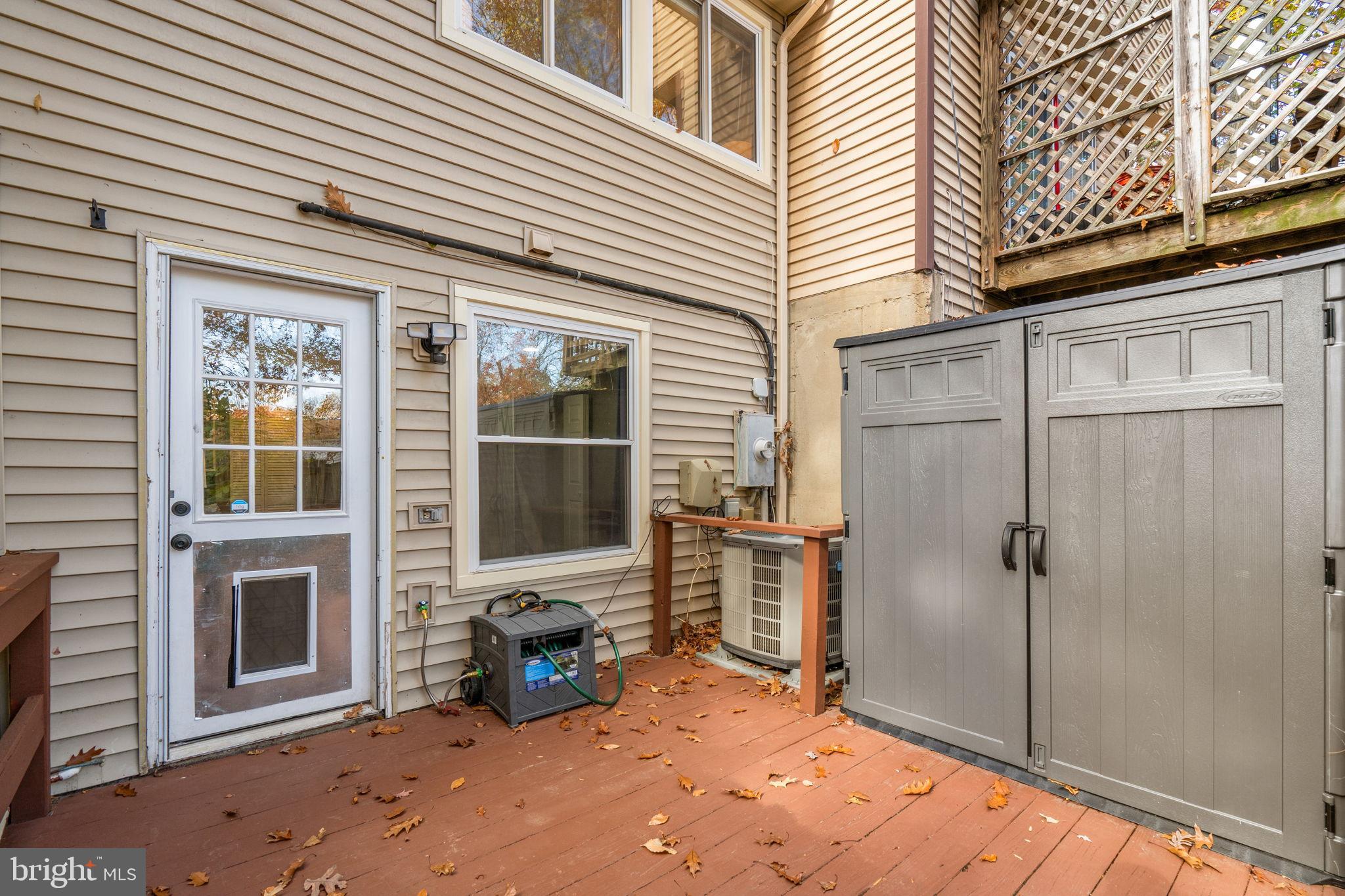8433 Sugar Creek Lane Springfield, VA 22153 - Photo 38 of 47 Charming outdoor space with storage options.