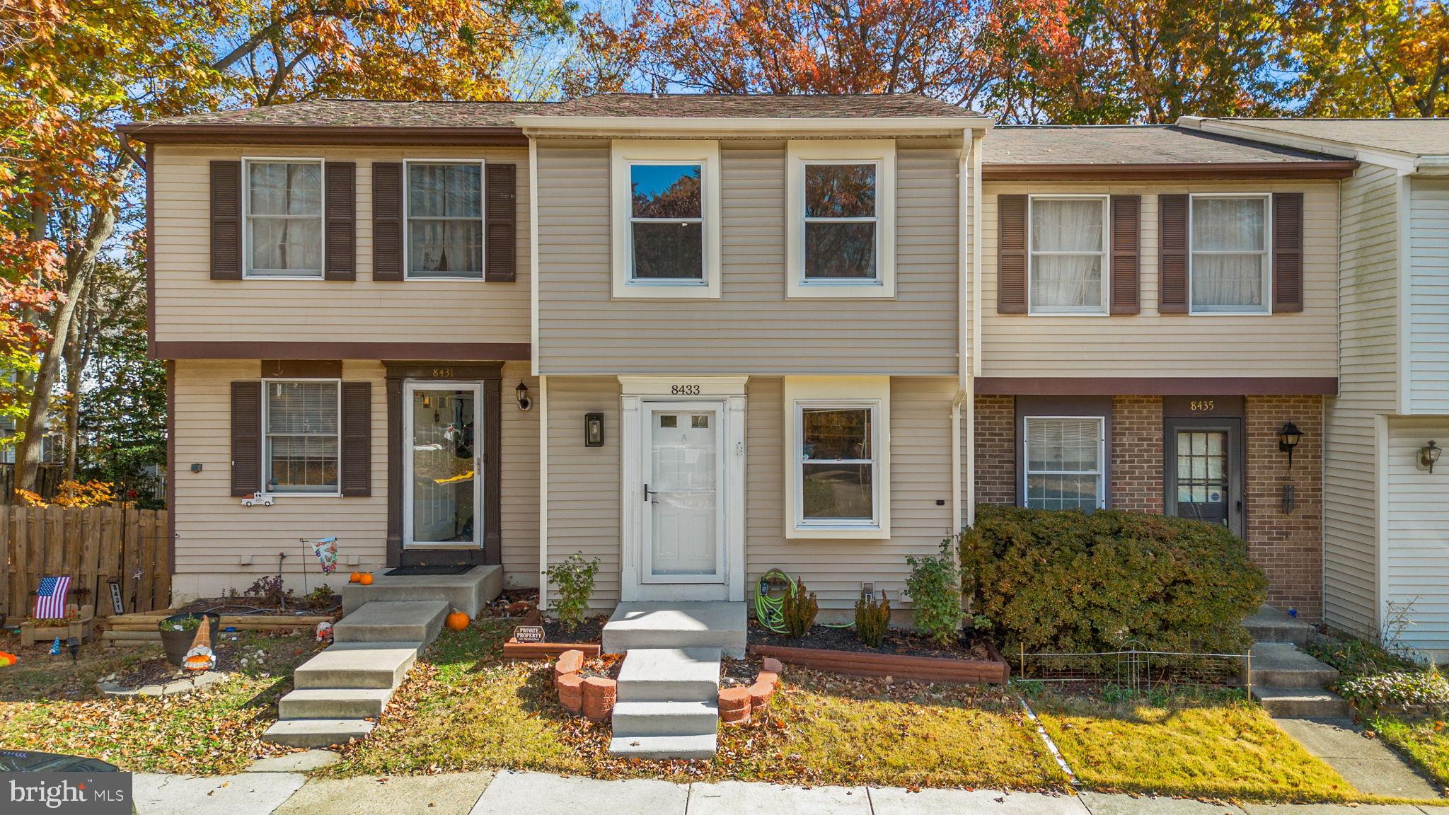 8433 Sugar Creek Lane Springfield, VA 22153 - Photo 47 of 47 Charming townhouse with autumn backdrop.