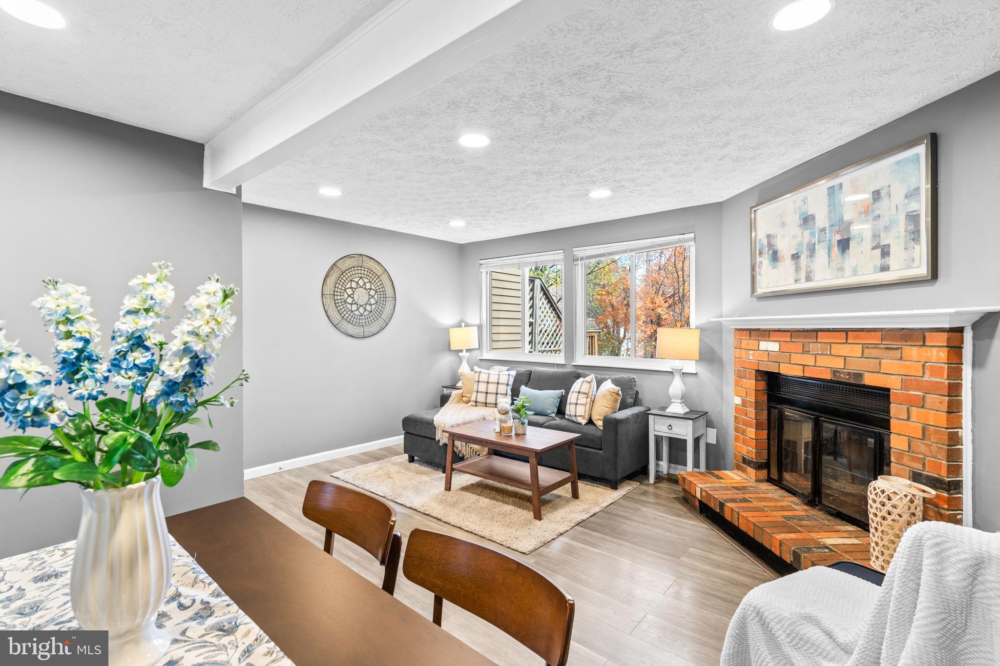 8433 Sugar Creek Lane Springfield, VA 22153 - Photo 5 of 47 Cozy living space with inviting warmth.