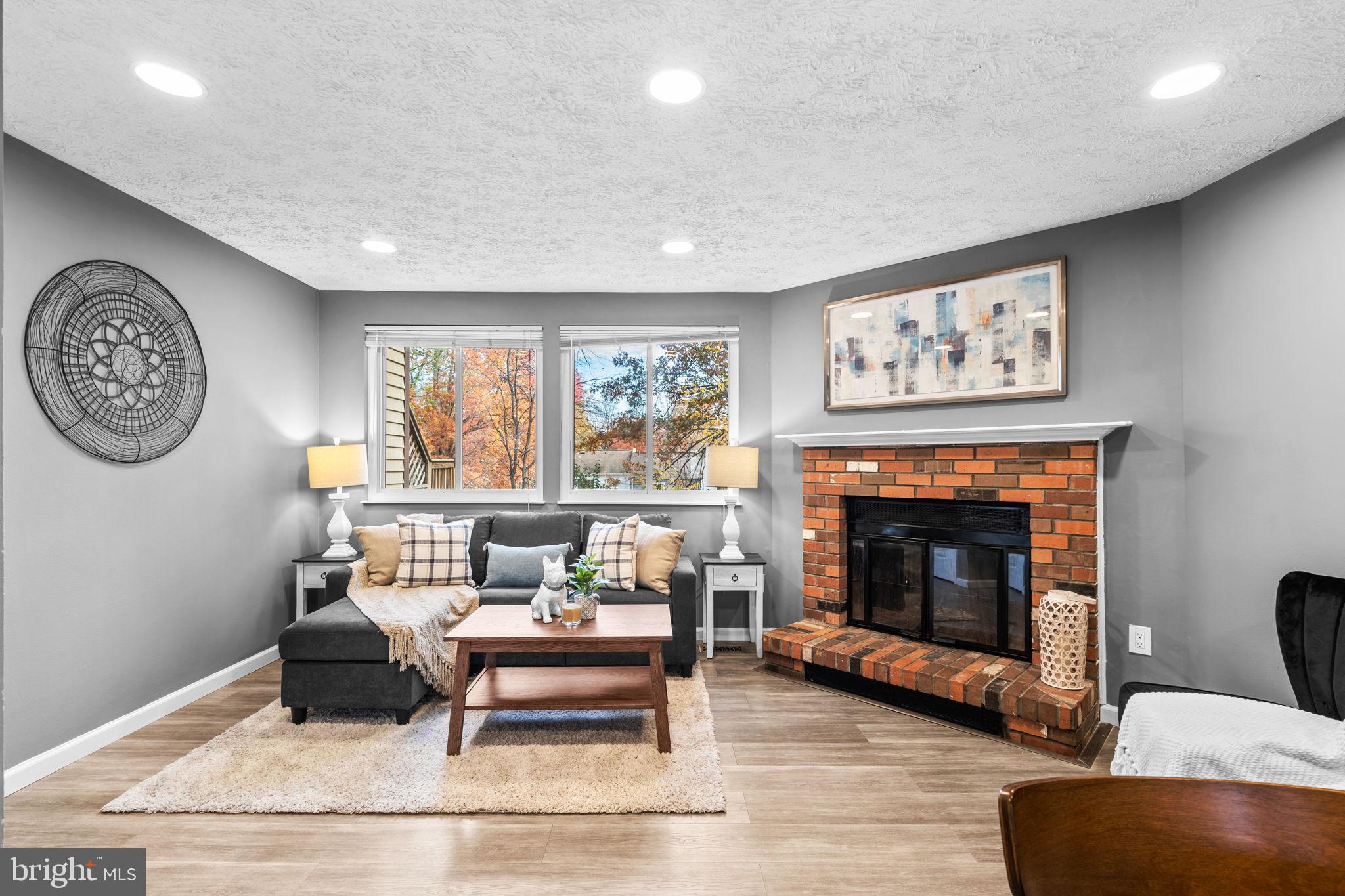 8433 Sugar Creek Lane Springfield, VA 22153 - Photo 6 of 47 Cozy living space with modern charm.