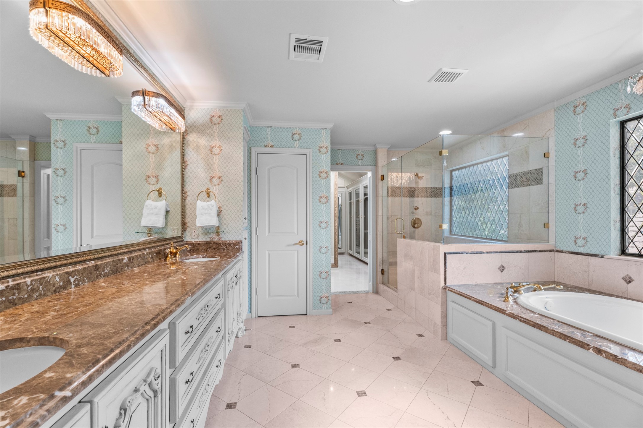 6106 Larkmount Drive Spring, TX 77389 - Photo 27 of 50 This primary bedroom ensuite is one for the magazines.