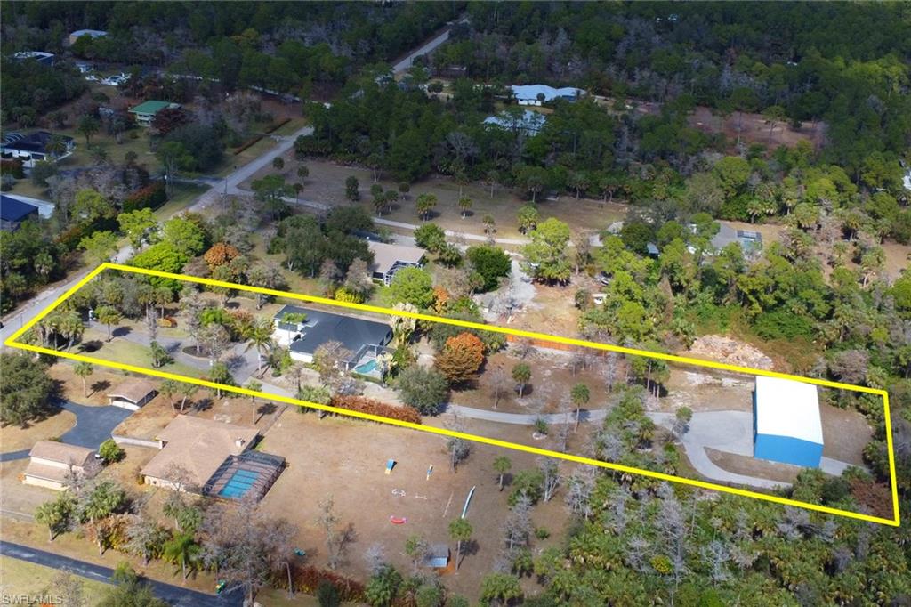 730 29th Street Southwest Naples, FL 34117 - Photo 49 of 50 Aerial view of property and surrounding area with property boundaries highlighted