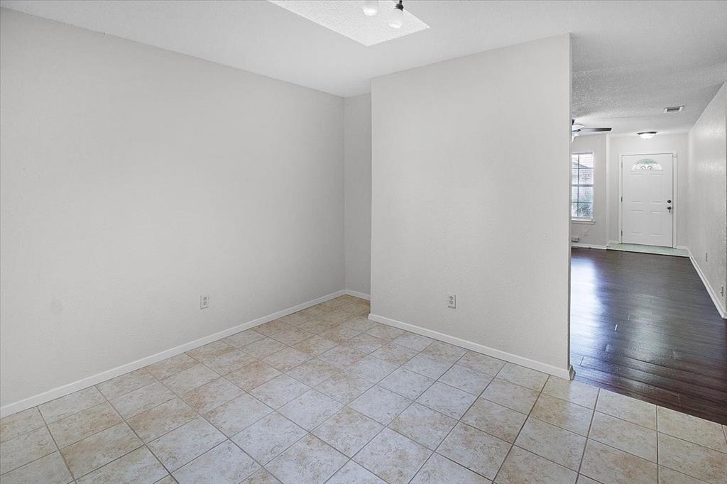 1903 Wyndemere Lane Garland, TX 75042 - Photo 12 of 28 wooden floor in an empty room