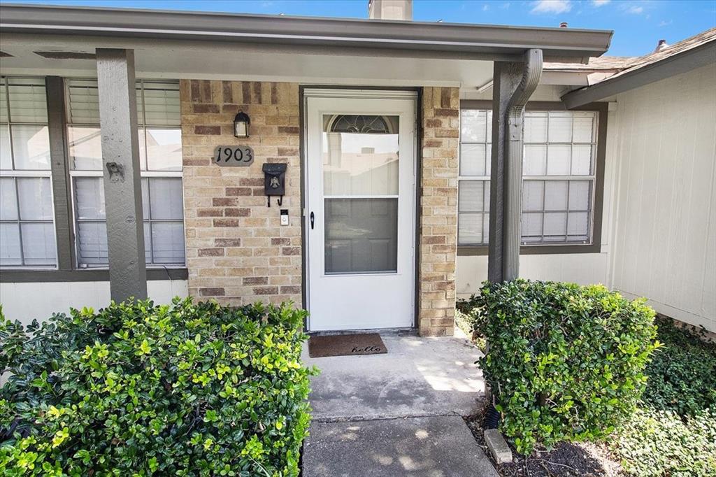 1903 Wyndemere Lane Garland, TX 75042 - Photo 28 of 28 a front view of a building