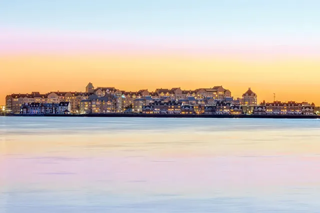 a view of parking garage with cars