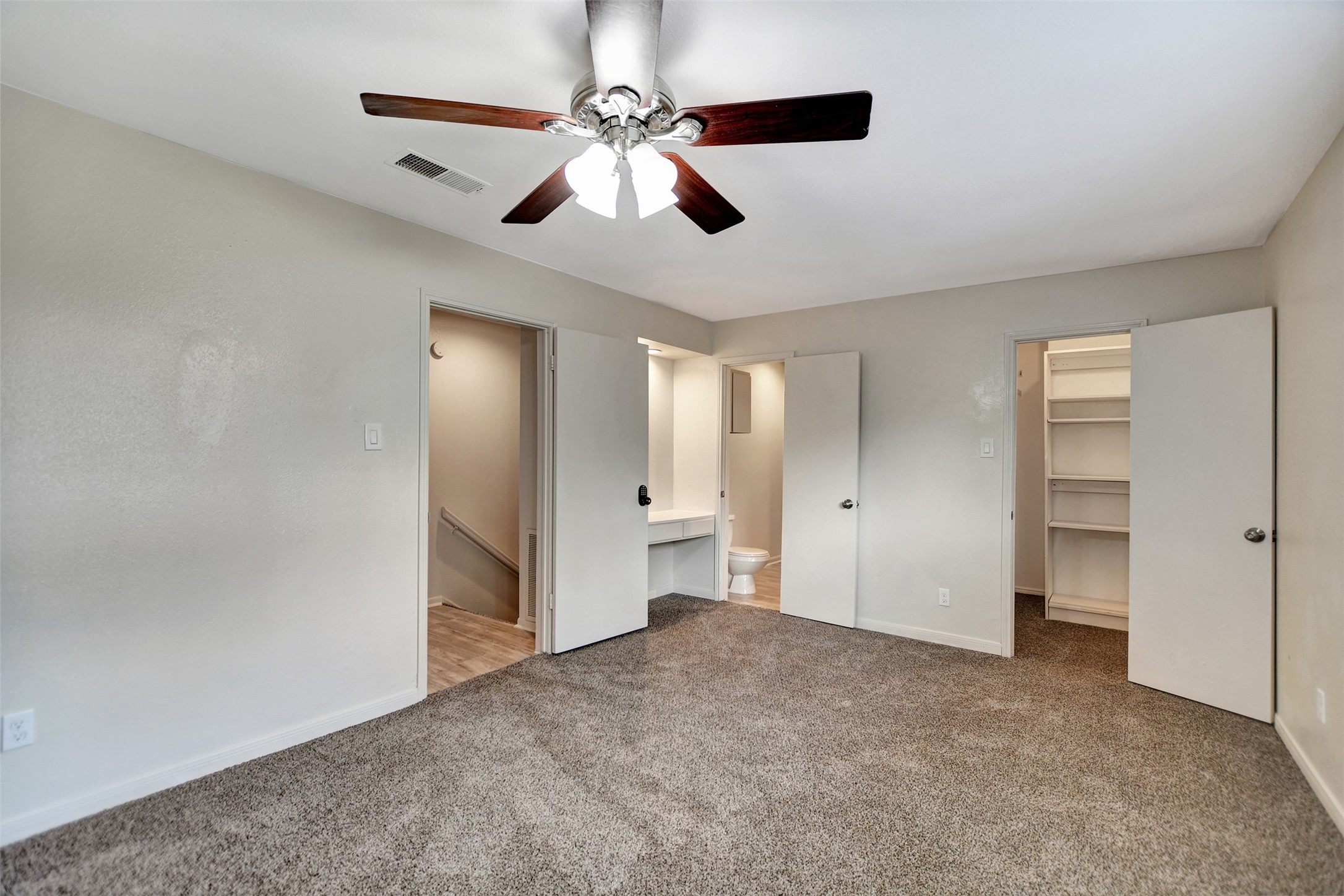 3826 Willow Springs Lane, Unit 3826 Houston, TX 77080 - Photo 33 of 43 a view of a livingroom with a ceiling fan and window